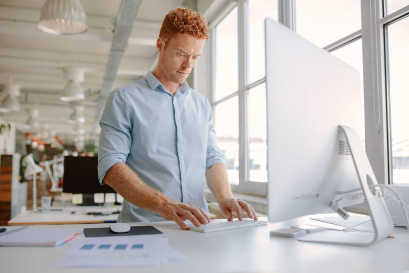 Use an Adjustable Desk to Boost your Health and Morale at Work